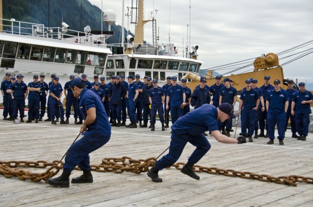 Teams pulled chains across the dock as part of the annual Coast Guard Buoy Tender Round-Up Olympics on July 18, 2012. (Photo by Heather Bryant/KTOO)