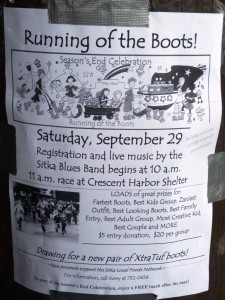 Duct tape holds a Running of the Boots poster to a post near Sitka's waterfront. The event is part of cruise-season's-end celebration.