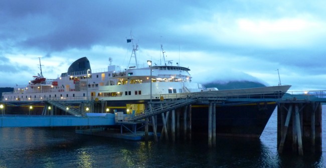 The ferry Malaspina sails out of Juneau's Auke Bay terminal in 2012. Its stack has since been painted yellow in honor of the 50th anniversary of the Alaska Marine Highway. Photo by Ed Schoenfeld, CoastAlaska News.