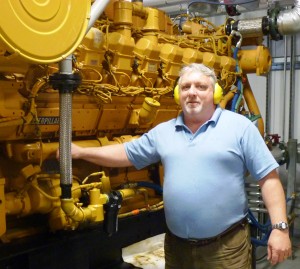 Yakutat Power's Scott Newlun talks about diesel generation at the community's diesel plant. He hopes wave (Ed Schoenfeld/CoastAlaska News)