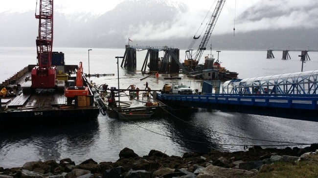 Western Marine Construction began working early Tuesday to refloat the dock. (Photo courtesy Jeremy Stephens, Alaska DOT&PF) 