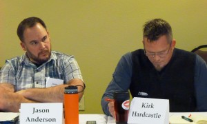  Jason Anderson, left, of the Forest Service and fisheries business owner Kirk Hardcastle listen during a Tongass Advisory Committee meeting at Juneau's Aspen Hotel. (Ed Schoenfeld/CoastAlaska News)