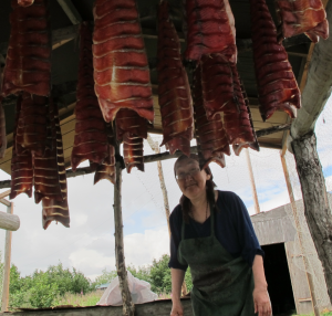 Marie Andrew was busy this July at her Napaskiak fish camp. (Photo by Ben Matheson/KYUKl)