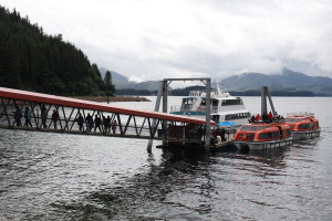 A tender boat picks up passengers to be brought back to ship. (Photo by Elizabeth Jenkins/KTOO) 