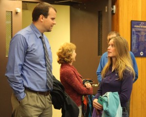 Nick Polasky talks with his client Kathleen Turley before trial Monday morning. (Photo by Lisa Phu/KTOO)